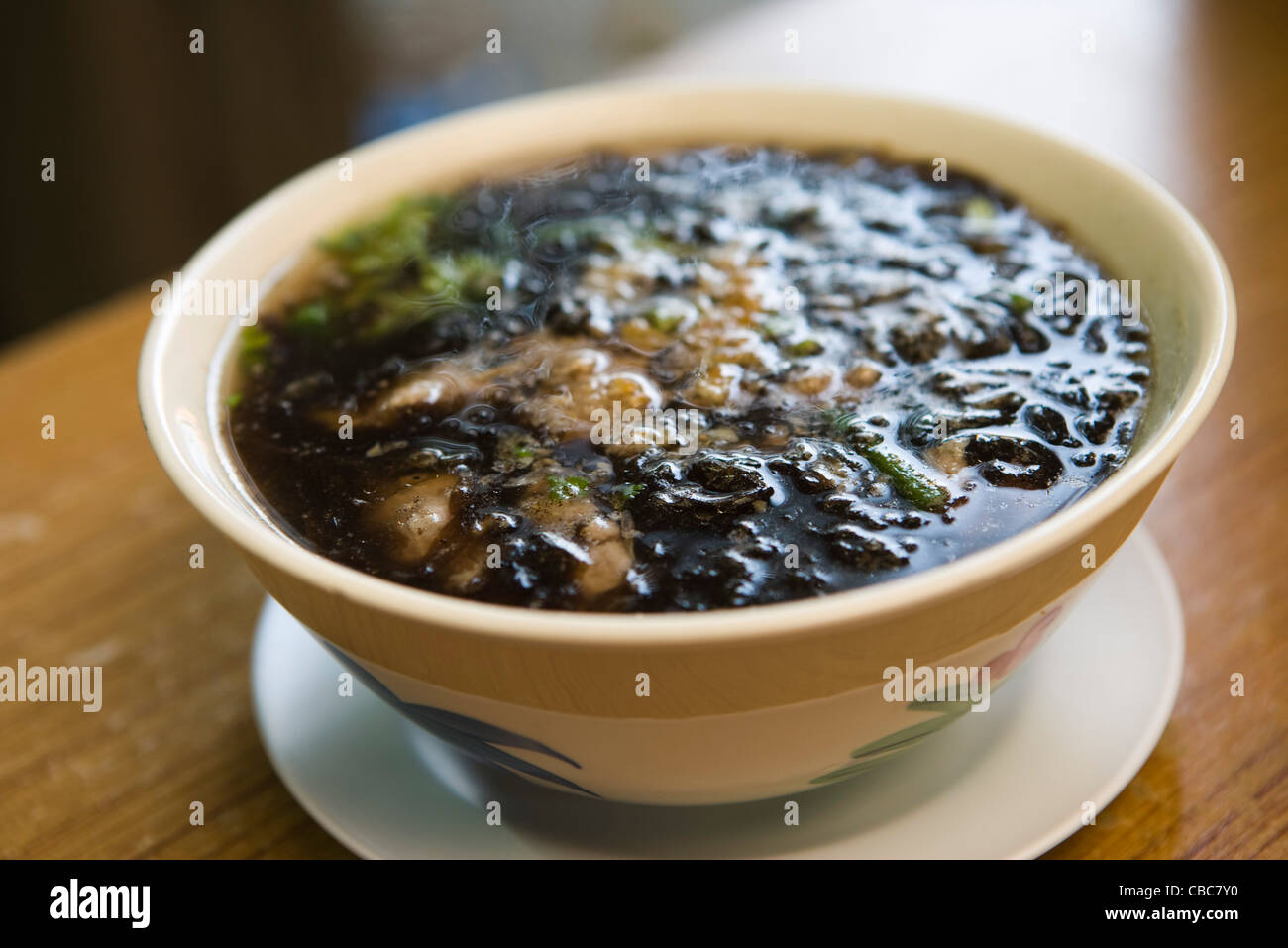 Soupe d'algues et de porc Banque D'Images