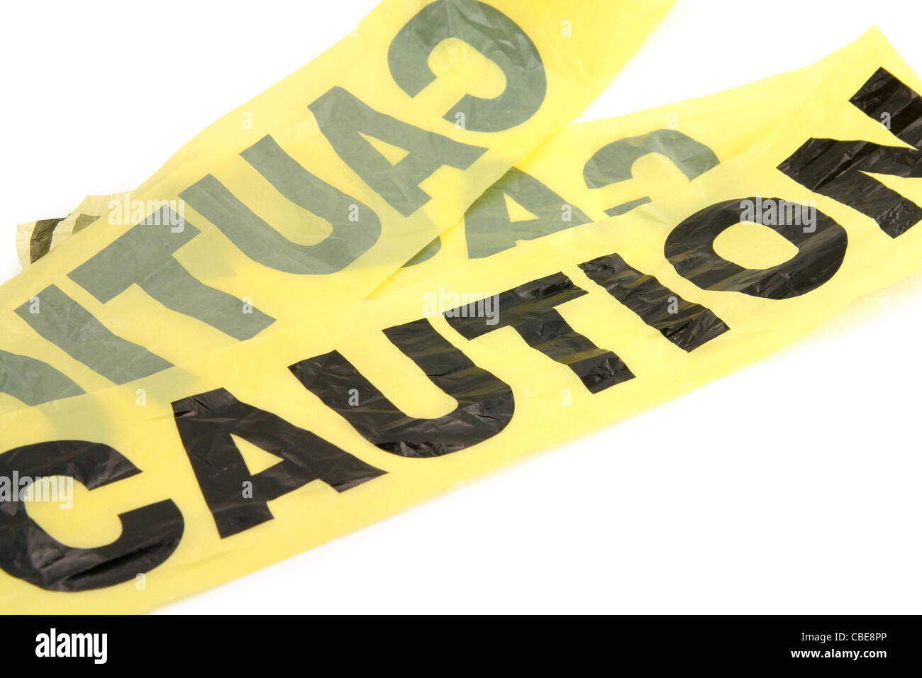 Ruban en plastique jaune avec un fond blanc Banque D'Images