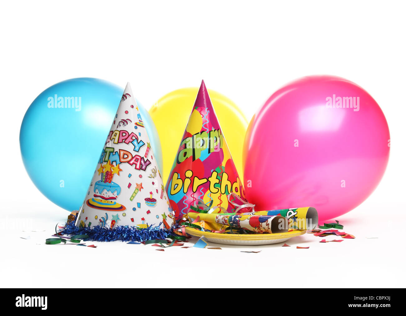 Décorations de fête d'anniversaire isolé sur blanc. Banque D'Images Décorations de fête d'anniversaire isolé sur blanc. Banque D'Images