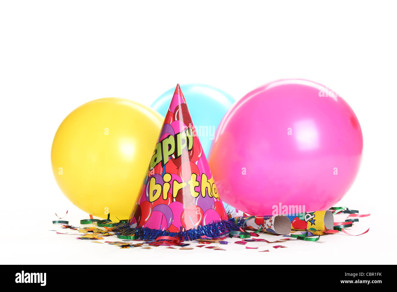 Décorations de fête d'anniversaire isolé sur blanc. Banque D'Images Décorations de fête d'anniversaire isolé sur blanc. Banque D'Images