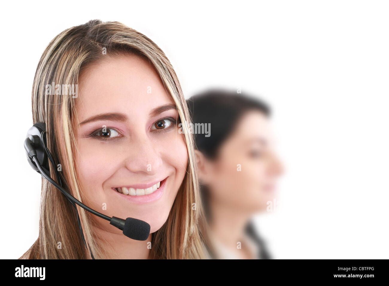 Belle representative smiling woman with headset call center. Banque D'Images