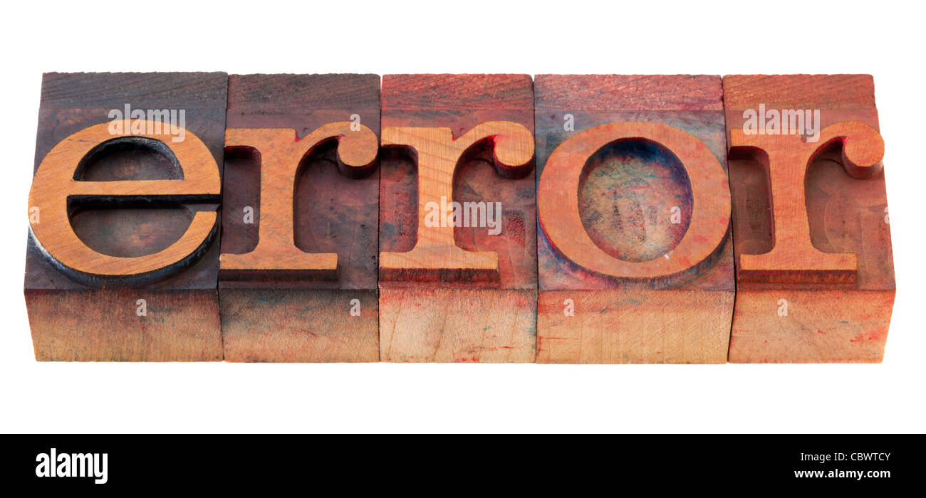 Mot d'erreur typographique en bois vintage en blocs, tachés par les encres de couleur, isolated on white Banque D'Images