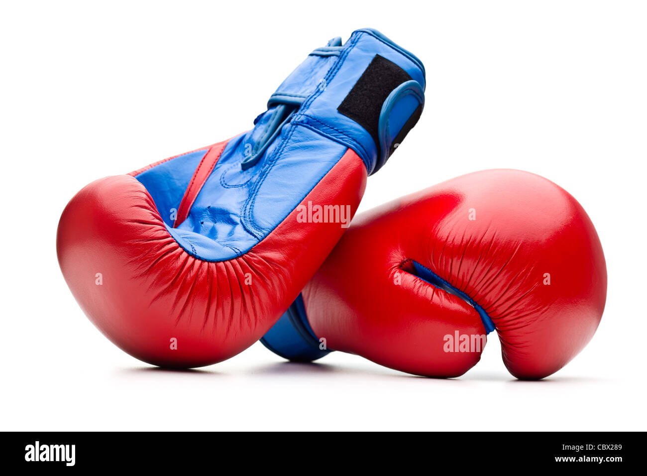 Gants de boxe rouge sur blanc Banque D'Images