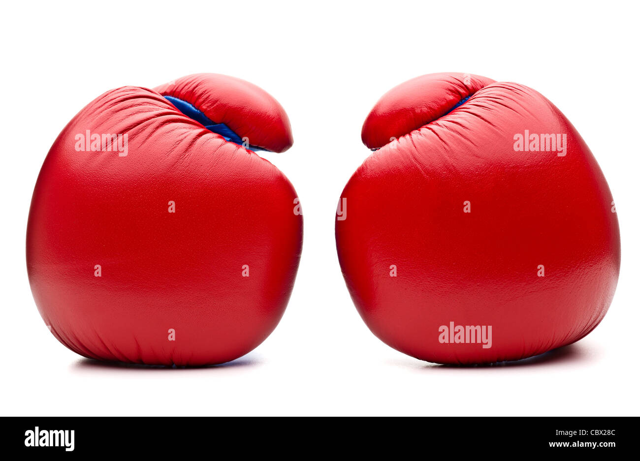 Gants de boxe rouge sur blanc Banque D'Images