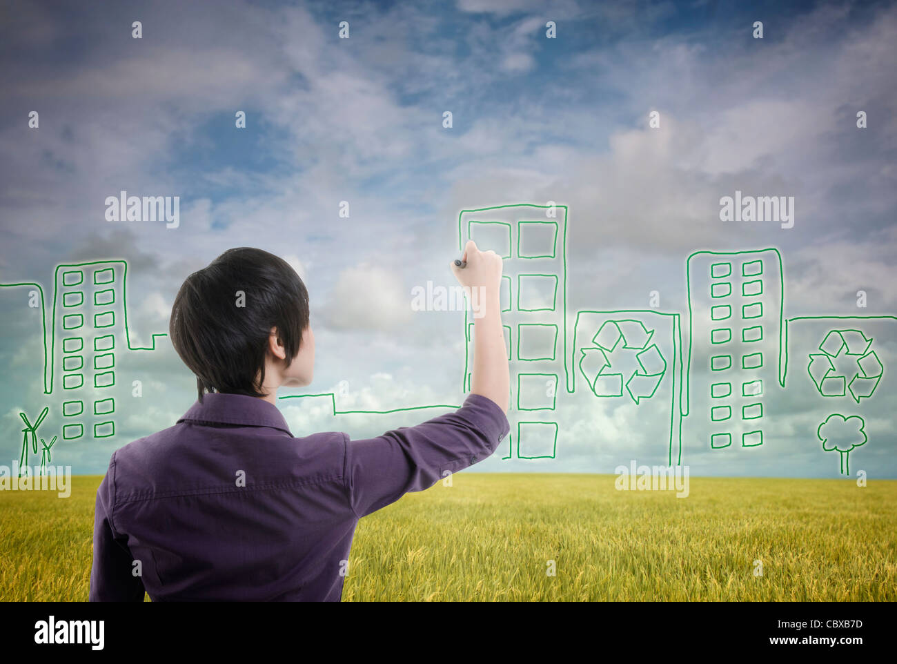 Asian male avec plan de développement de la ville durable Banque D'Images