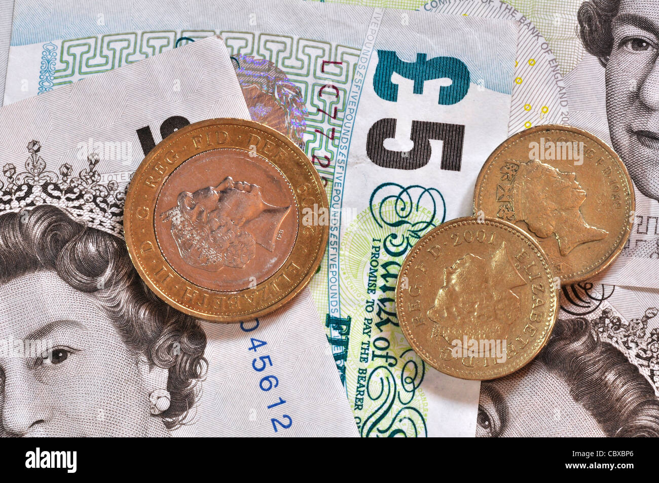 L'une et deux pièces livre et 5 pound note UK Banque D'Images