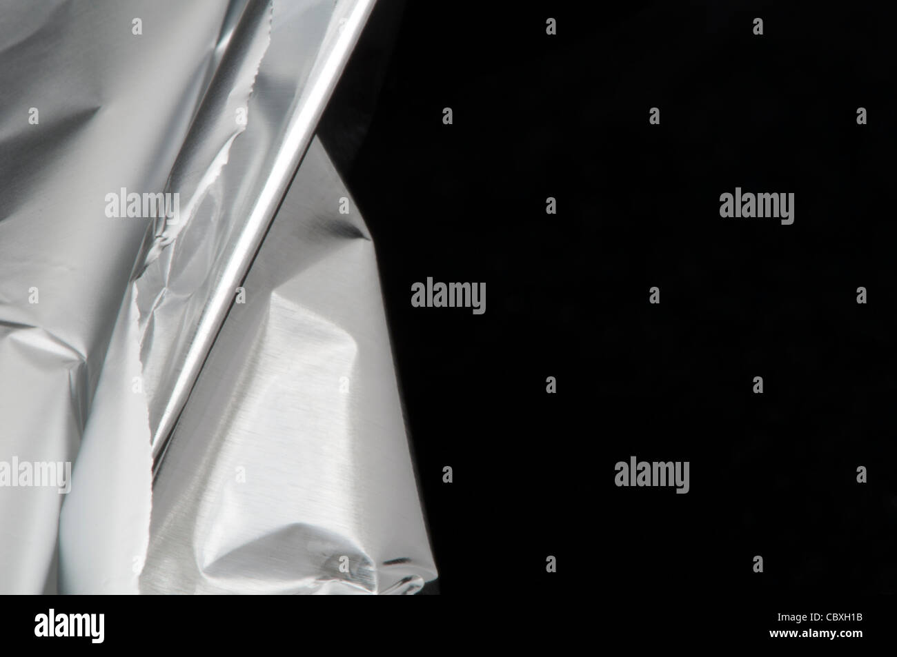 Faire cuire d'aluminium sur fond noir Banque D'Images
