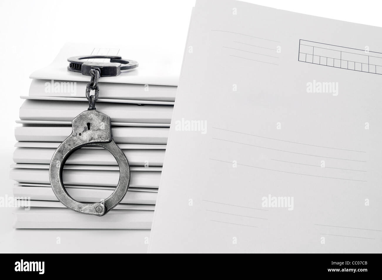 Menottes et fichier vide Banque D'Images