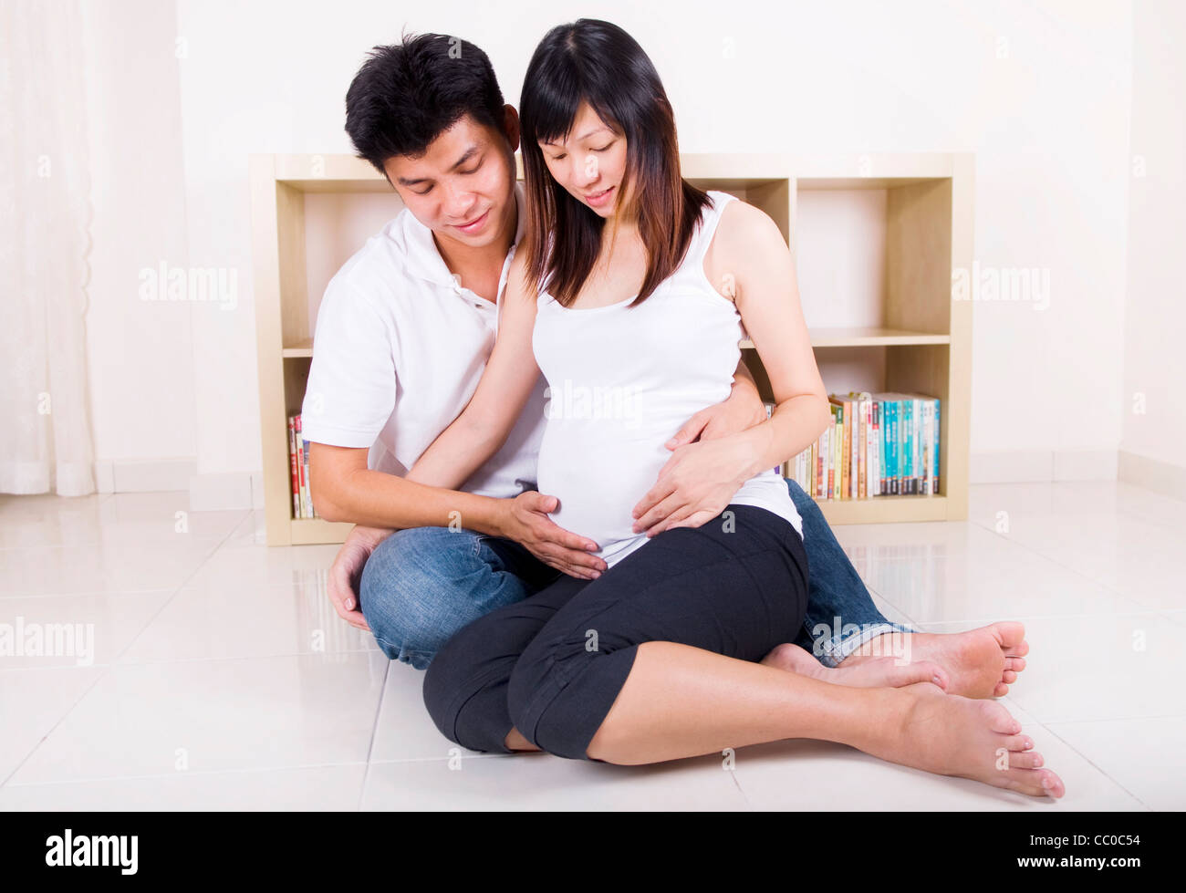 Mari et femme enceinte de 8 mois. Banque D'Images