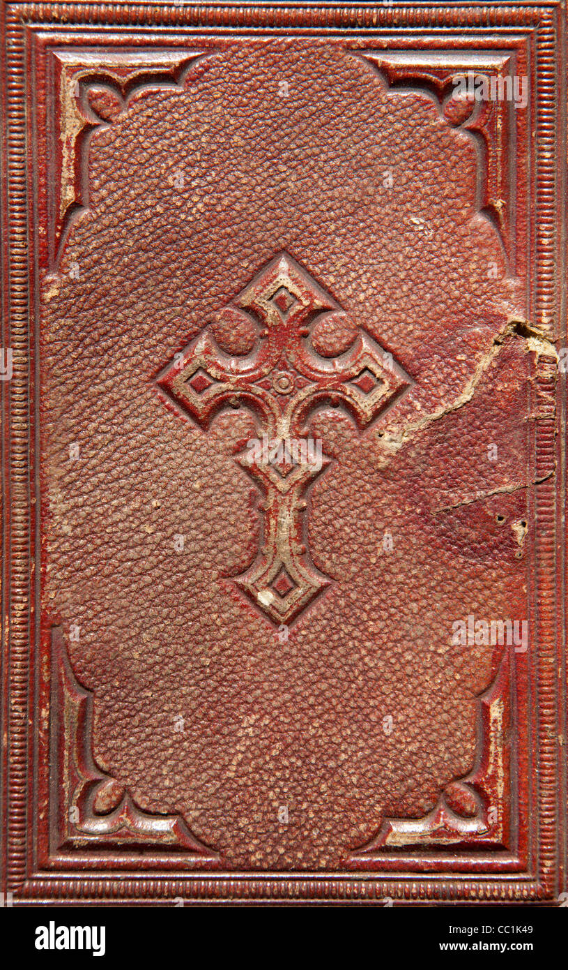 Croix sur le vieux livre Banque D'Images