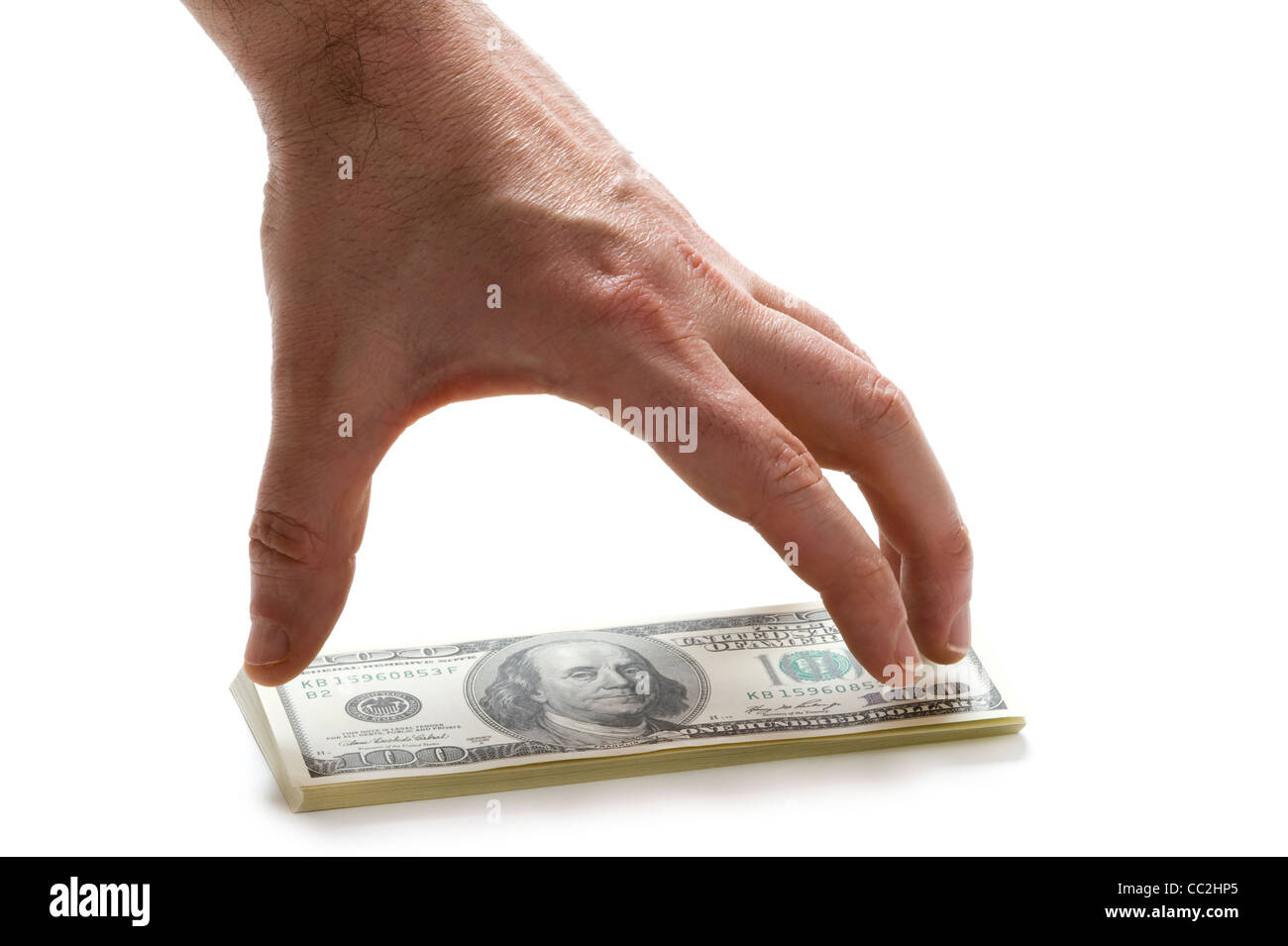 Un homme part pour atteindre une liasse de 100 (cent) américain dollar bills Banque D'Images
