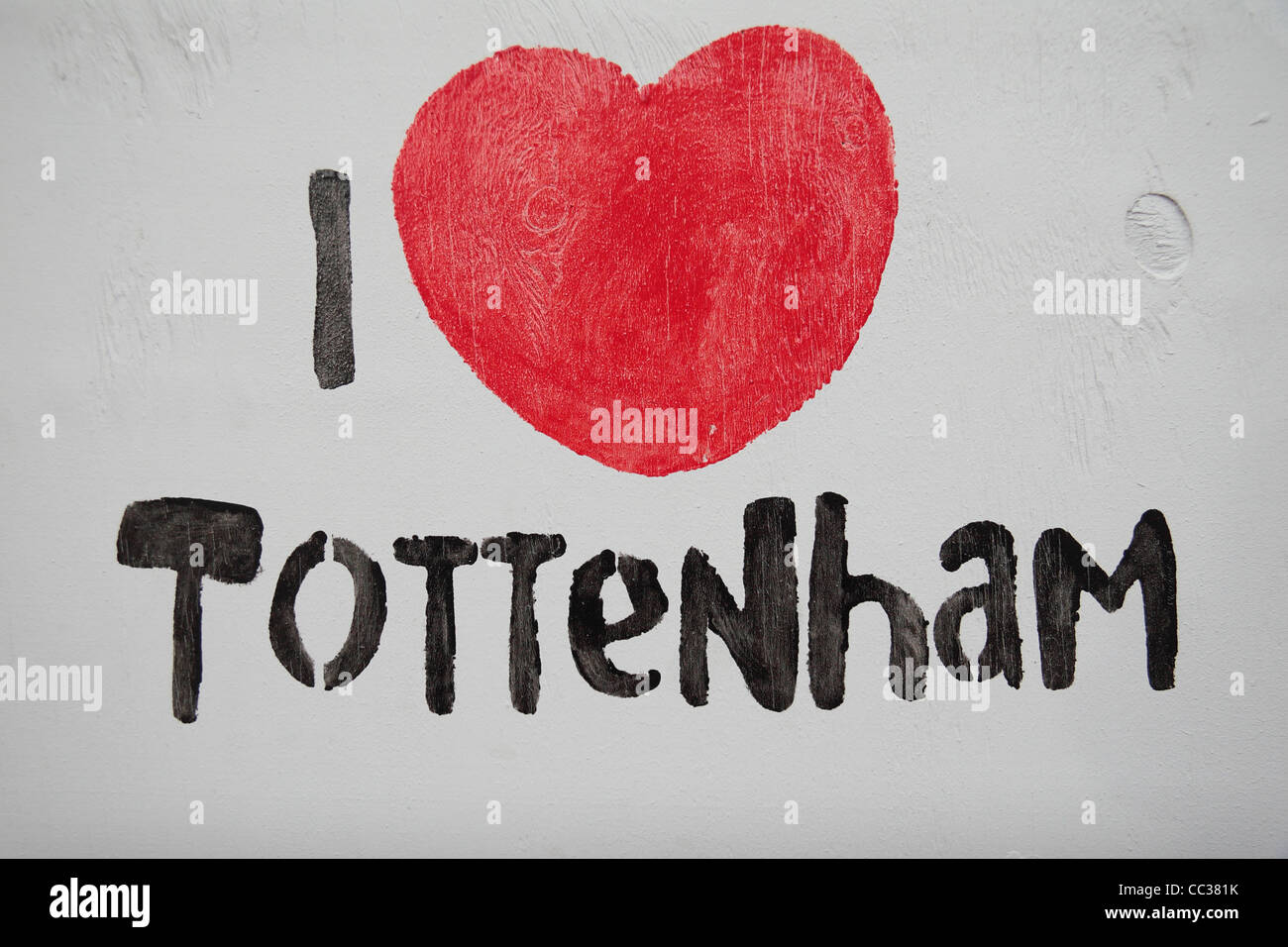 Le 'J'aime' Tottenham logo campagne sur un mur sur Tottenham High Road, Tottenham, London, UK. Banque D'Images