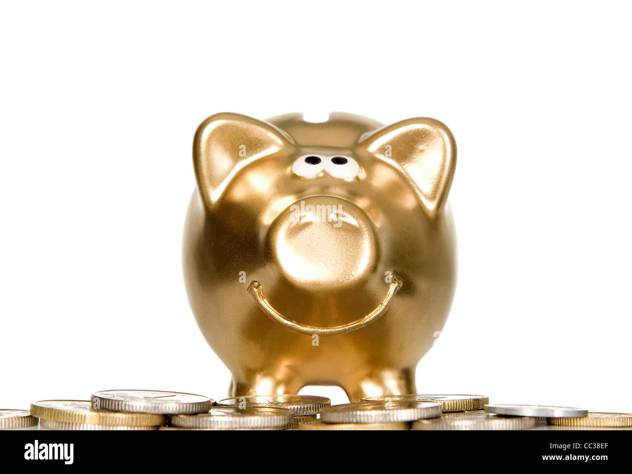 L'argent d'or fort cochon debout sur des crédits Banque D'Images