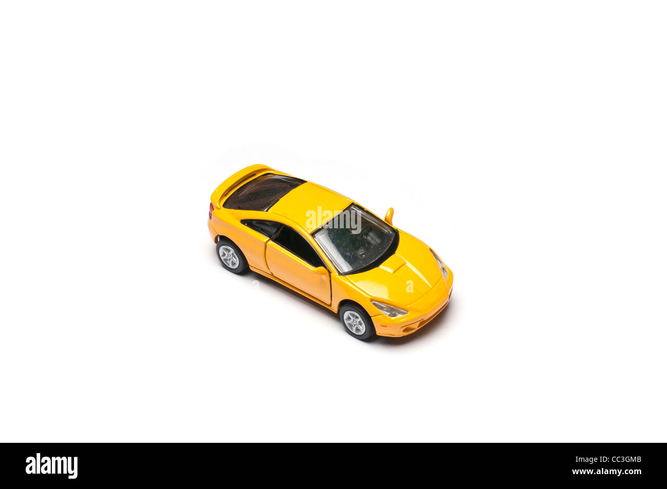 Une voiture de sport jouet jaune Banque D'Images