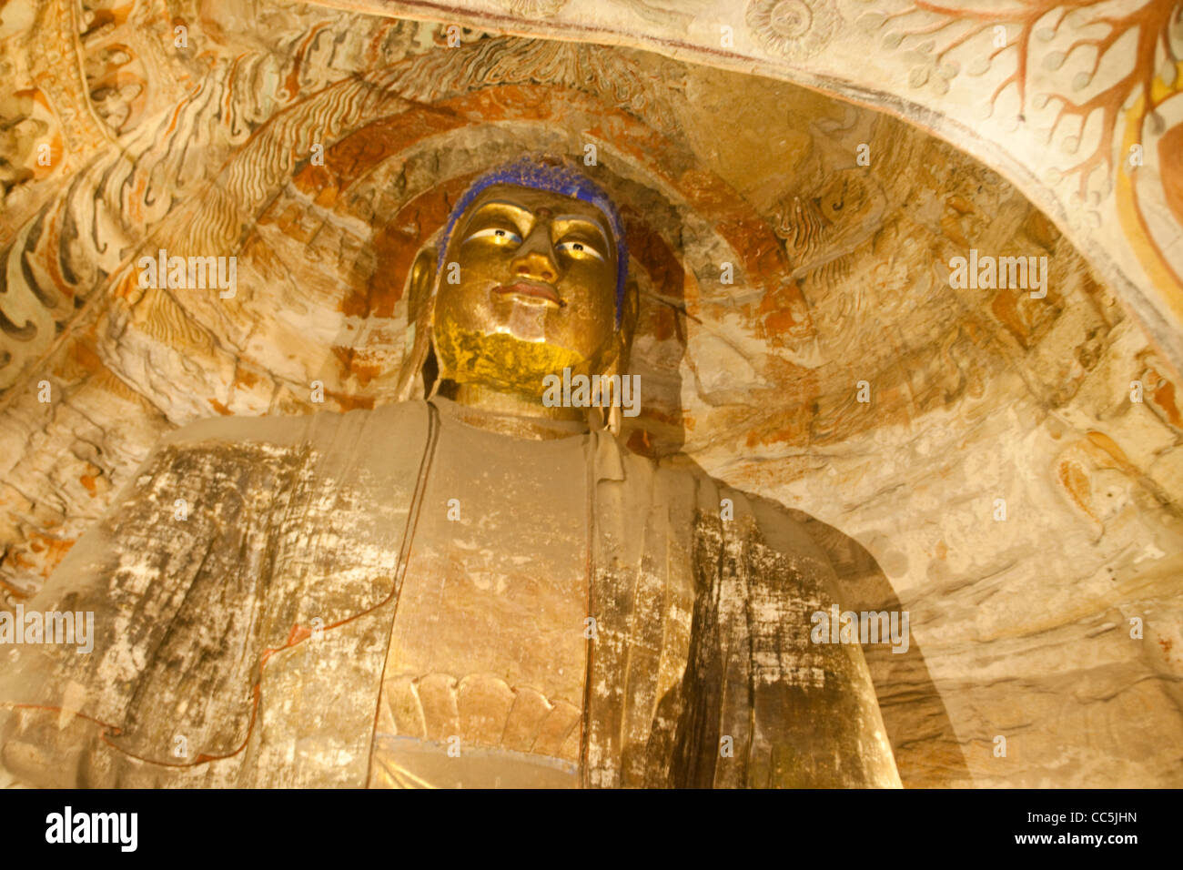 Statue de Sakyamuni, grottes de Yungang, Datong, Shanxi , Chine Banque D'Images