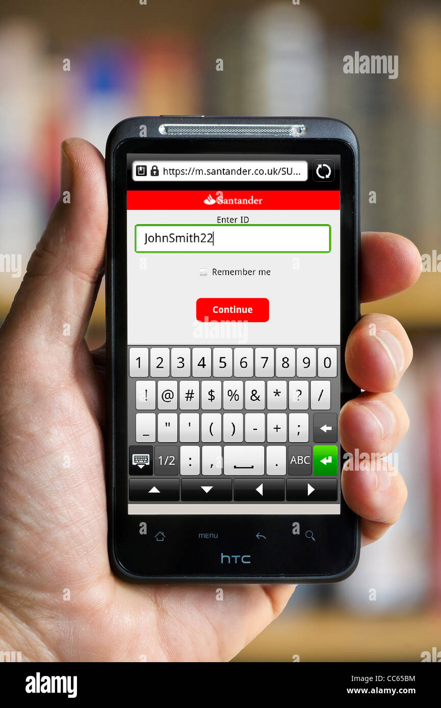Mobile Banking avec Santander sur un smartphone HTC Banque D'Images
