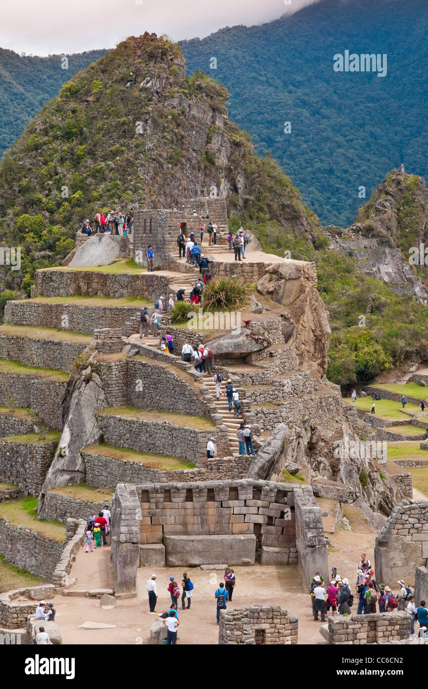 Machu Picchu, site du patrimoine mondial de l'ancienne demeure de pierre Inca ruins, Aguas Calientes, Pérou. Banque D'Images