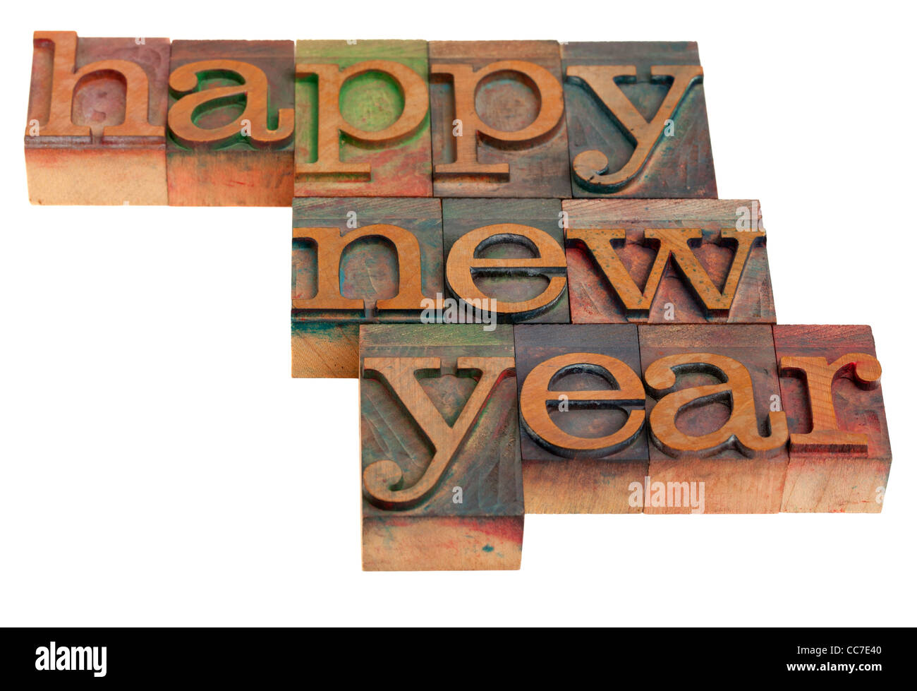 Bonne année salutations dans la typographie en bois vintage blocks, isolated on white Banque D'Images