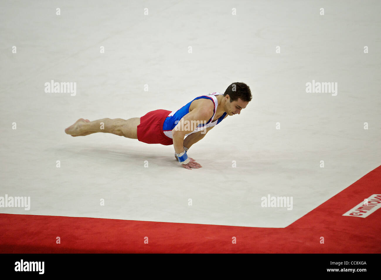 Gaël da SILVA (FRA), participe à l'exercice au sol, la Visa International Londres prépare la gymnastique, Banque D'Images