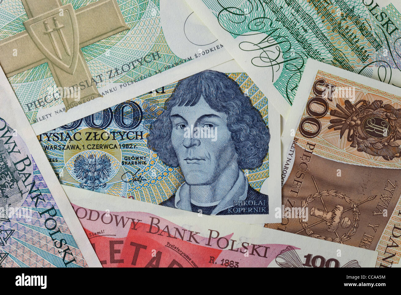 L'astronome Copernic (portrait) sur un billet de banque polonaise vintage encadrée par d'autres billets de la même édition Banque D'Images