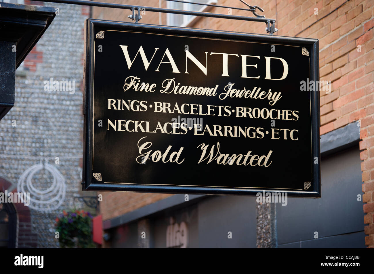 Signe ci-dessus un bijoutier Brighton Lanes voulant diamants d'occasion, bagues, bracelets, broches, colliers boucles d'oreilles et or. Brighton Sussex Angleterre Royaume-Uni Banque D'Images