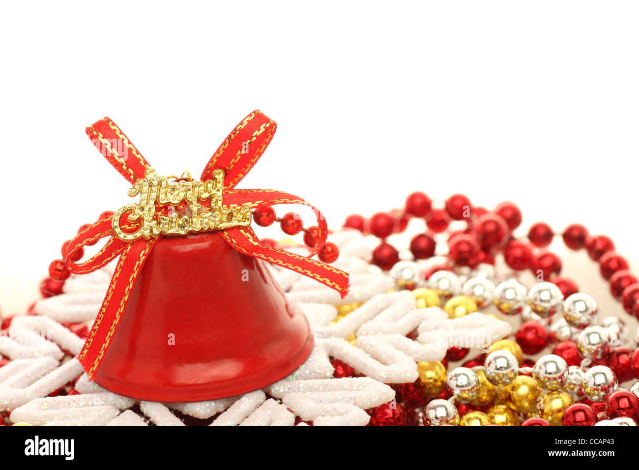 Décorations de Noël : bell sur près d'un flocon beads Banque D'Images