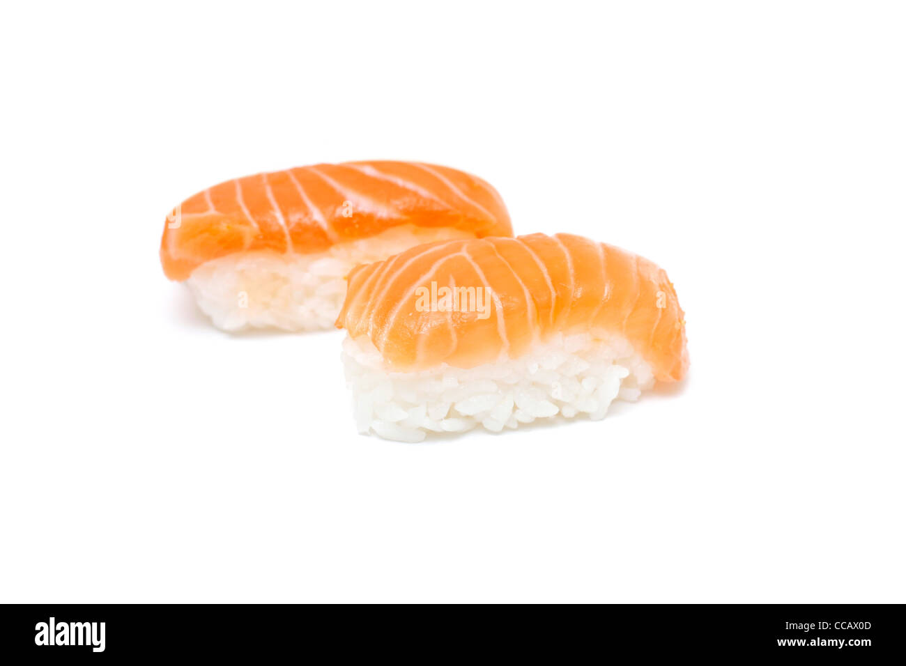 Delicious salmon nigiris isolated on white Banque D'Images