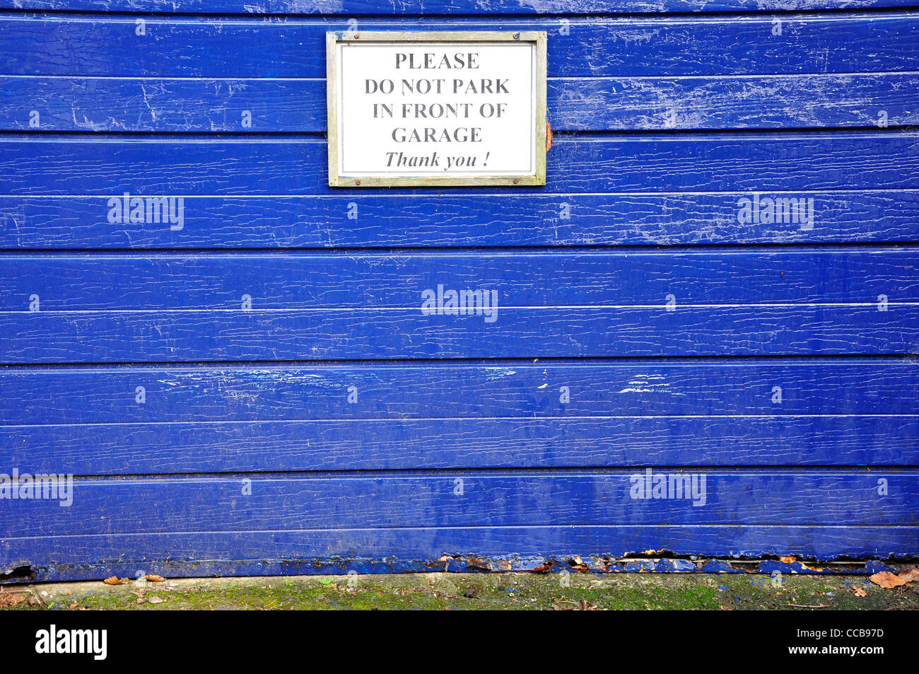 Rester à l'écart ne pas stationner en face de garage Banque D'Images