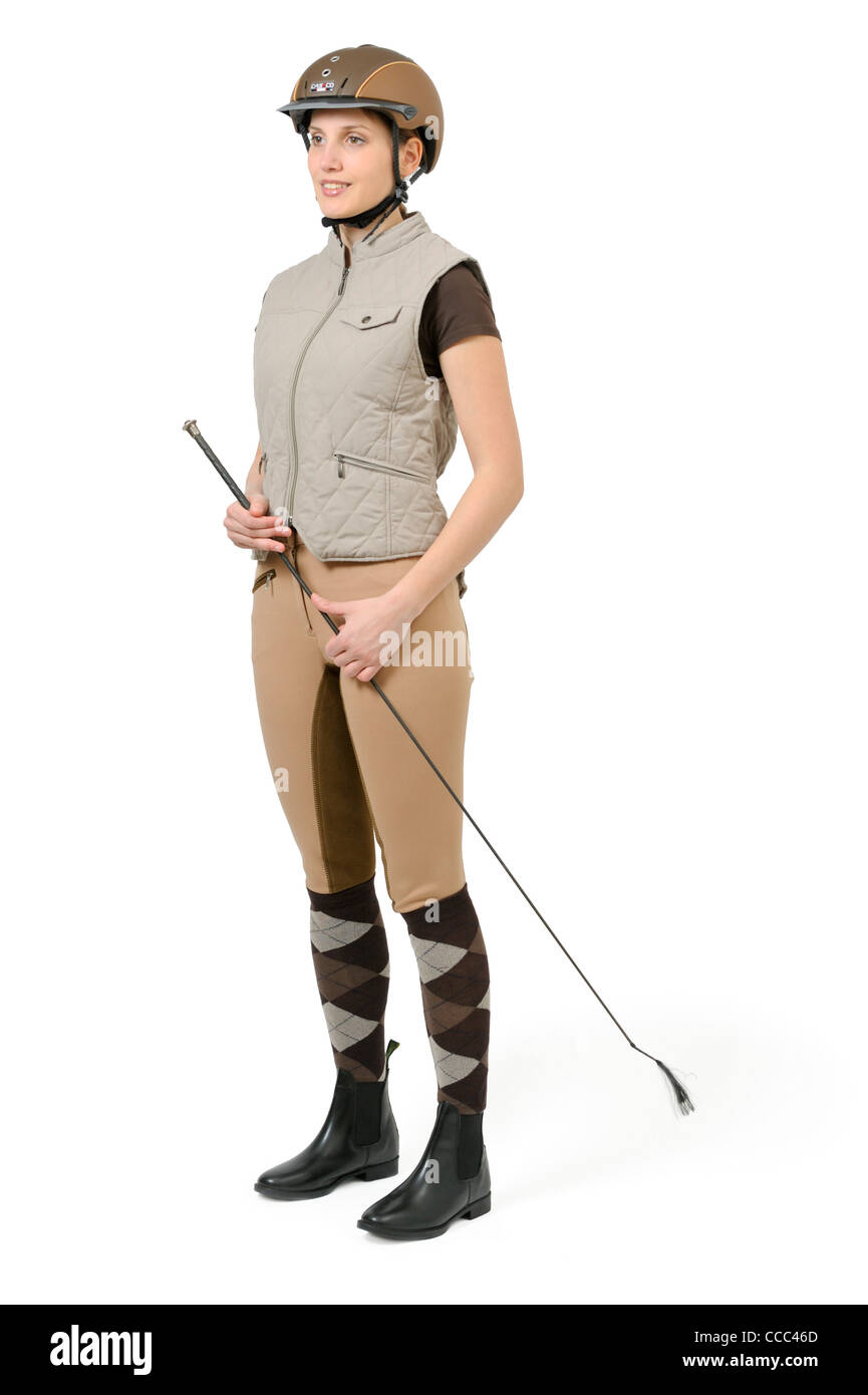 Jeune portant un casque moderne, gilet d'équitation, culottes, Jodhpur  boots et un fouet Photo Stock - Alamy