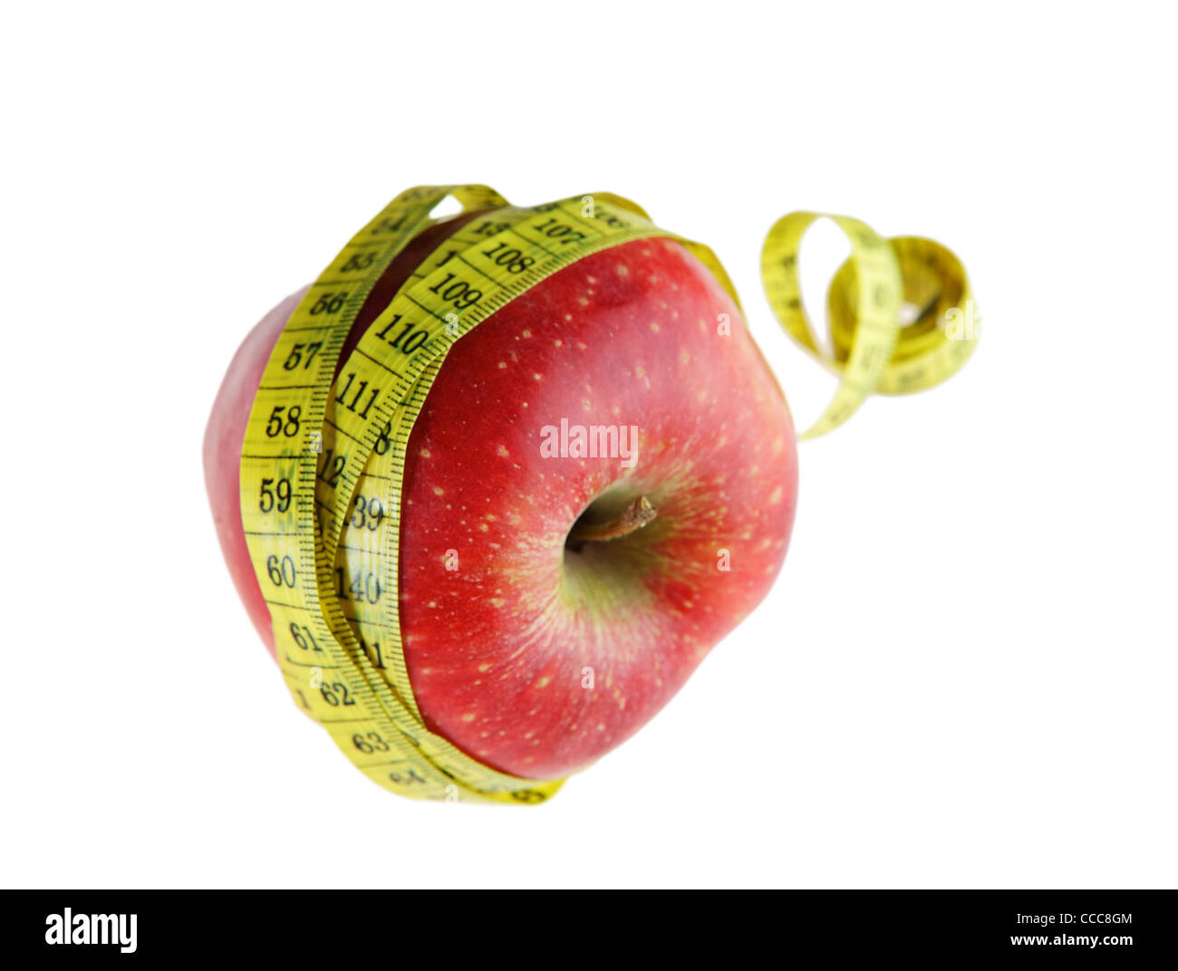 Ripe red apple avec un ruban à mesurer Banque D'Images