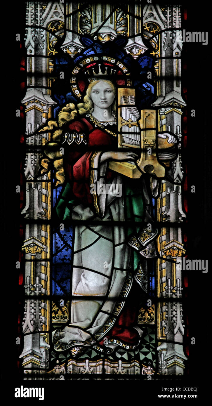 Une vitrail de Henry Victor Milner représentant Saint Cecilia, l'église Saint-Nicolas, Islip, Northamptonshire Banque D'Images