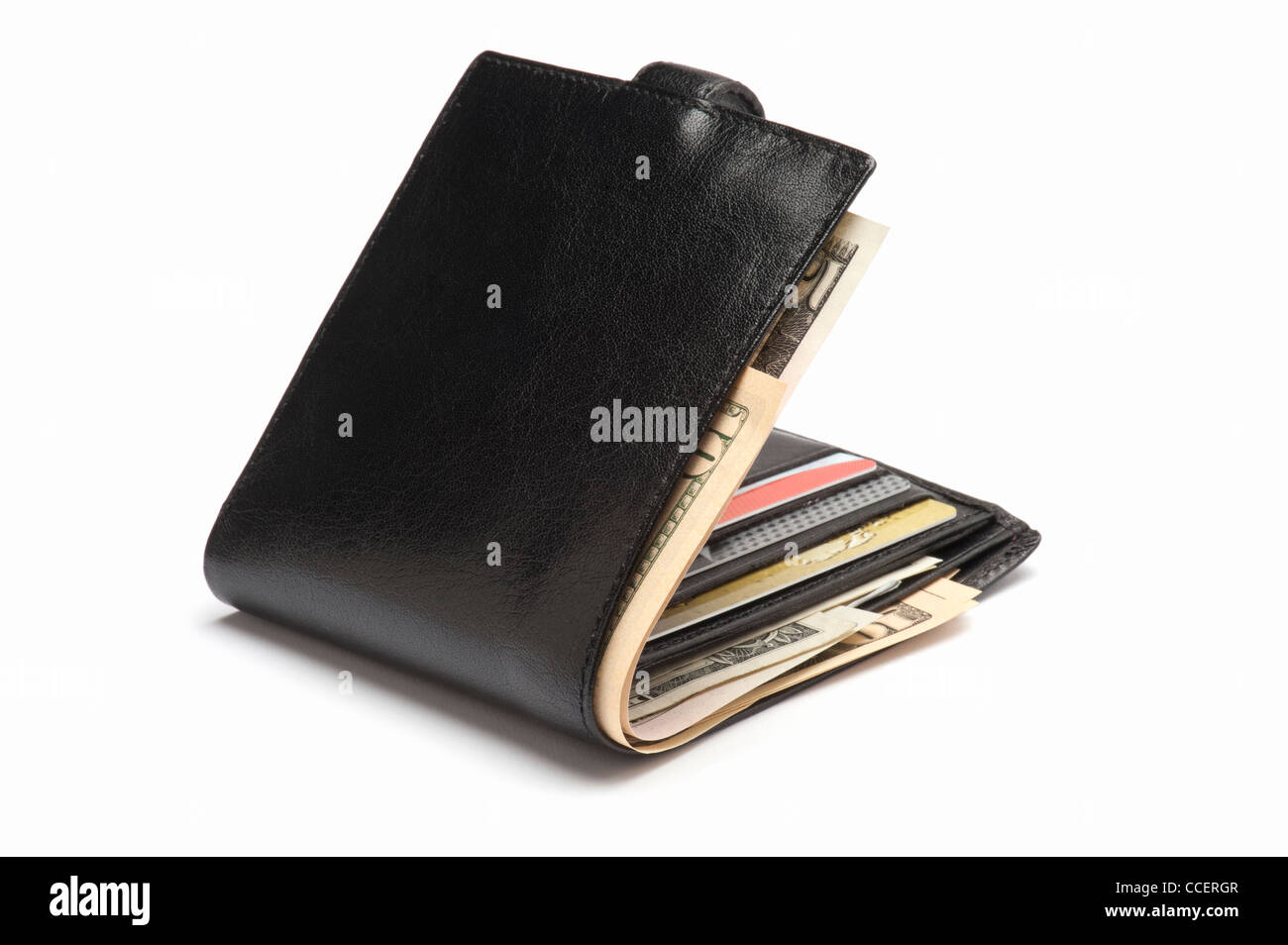 Un portefeuille en cuir noir contenant des cartes et dollars US Banque D'Images