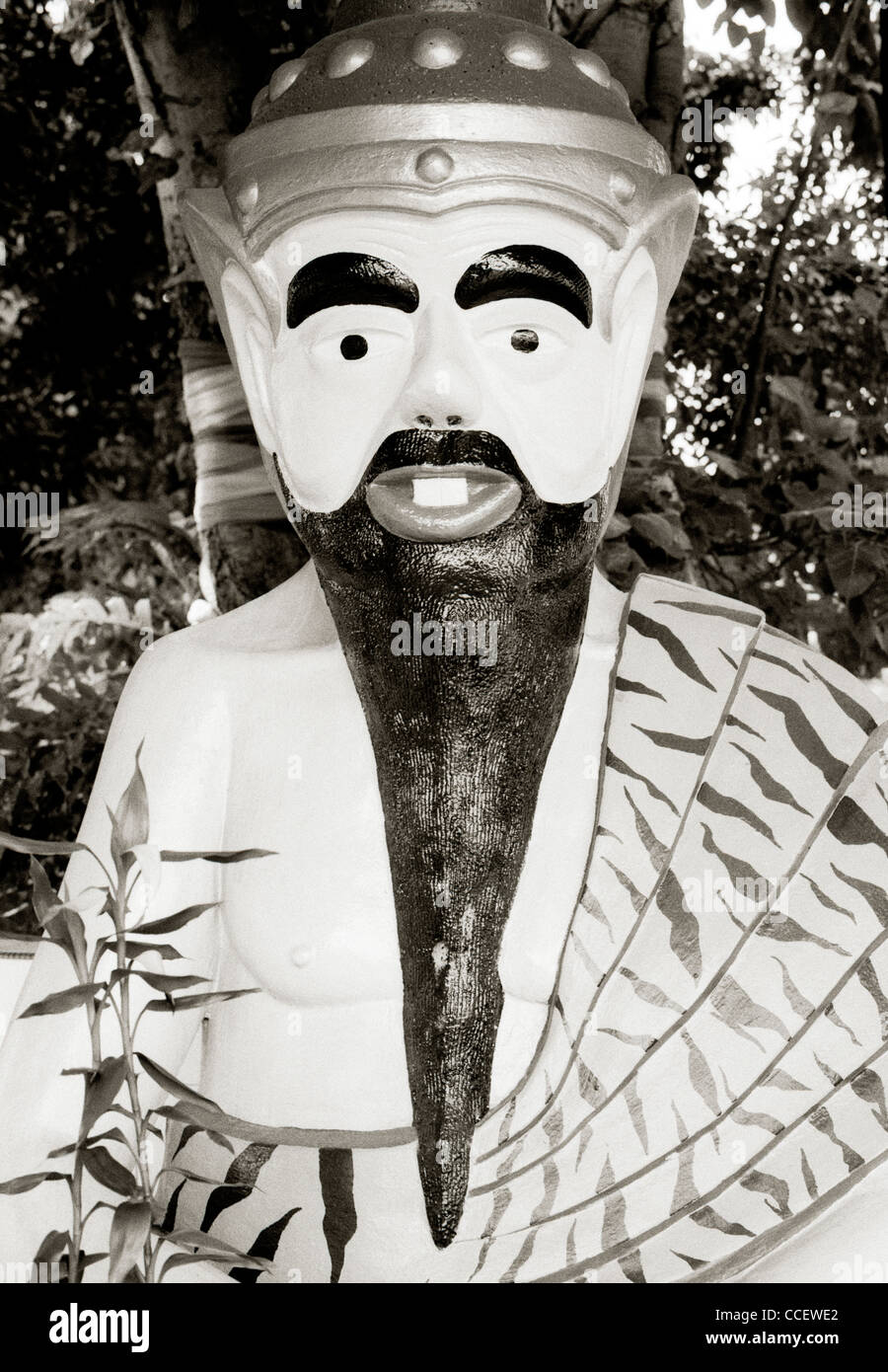 Dingo buck dans Bouddha Wat Buppharam crantée à George Town dans l'île de Penang en Malaisie en Extrême-Orient Asie du sud-est. Art Humour drôle de visage Bizarre Banque D'Images
