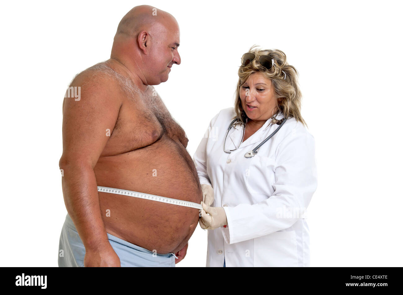 Grand mâle patient avec gros ventre et médecin Banque D'Images
