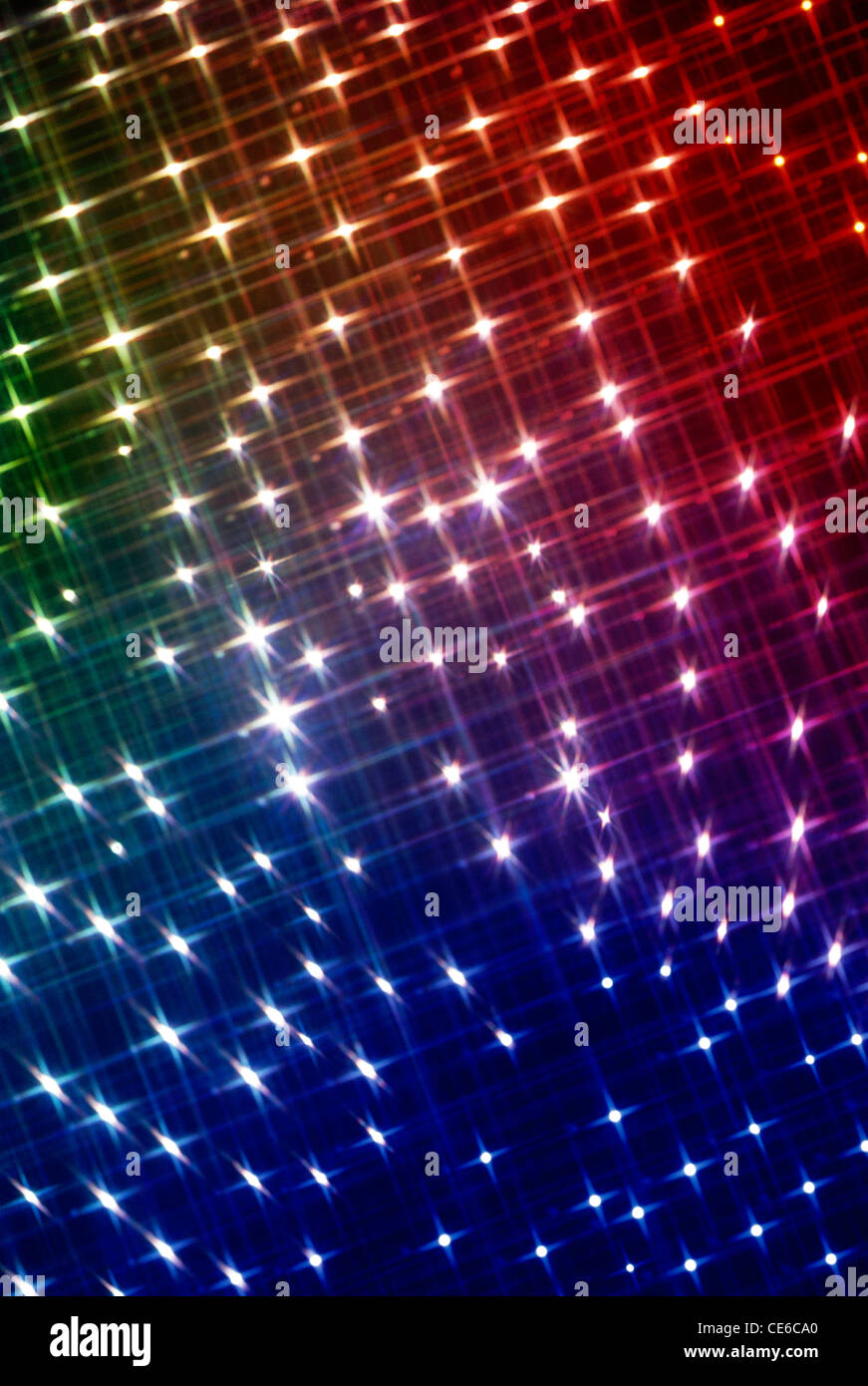 Étoiles brillantes ; arc-en-ciel ; bleu vert rouge ; lumières de scène ; Banque D'Images