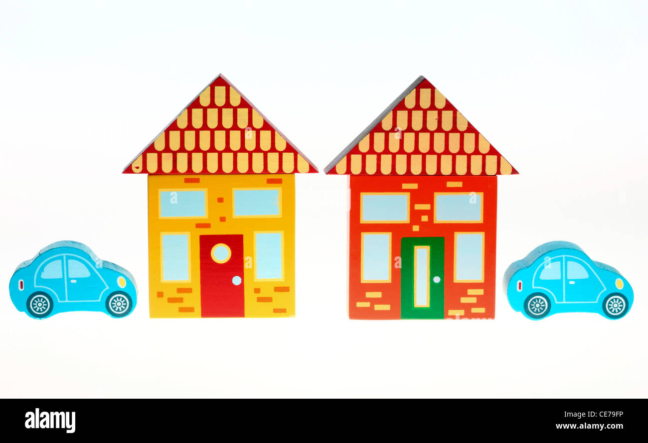 Image symbole. Vivant dans une ville, ville, village, le logement. Des blocs colorés, faits de bois. Les jouets. Banque D'Images