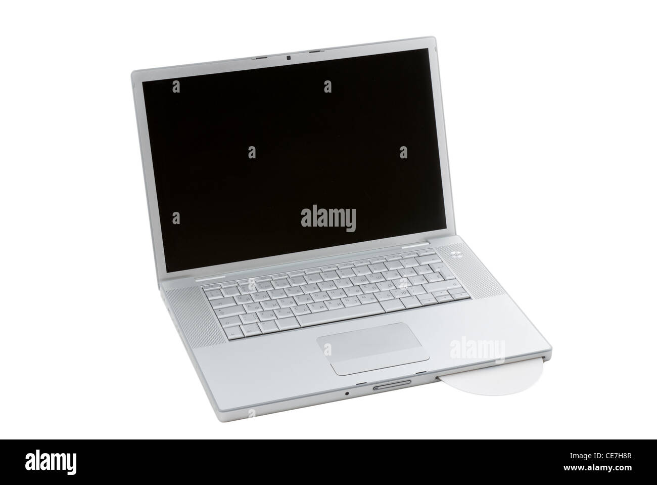 Ordinateur portable d'argent avec le CD inséré. 3/4 vue. Banque D'Images