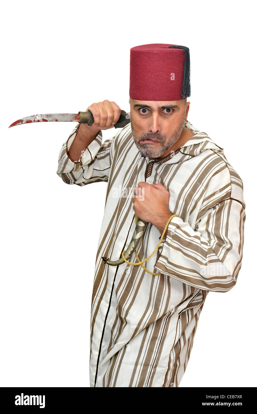 L'homme arabe avec un poignard making funny faces isolées dans White Banque D'Images
