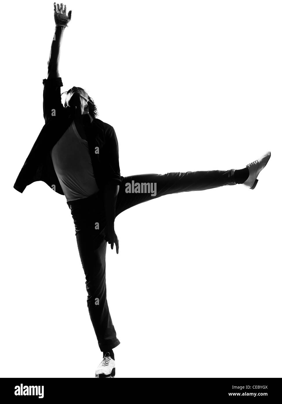 Longueur totale silhouette d'un jeune homme danseur hip hop funky r&b sur studio isolé sur fond blanc Banque D'Images