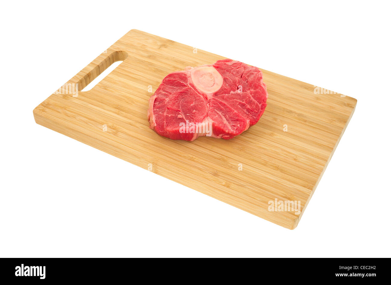 Steak de boeuf jarret arrière on cutting board Banque D'Images