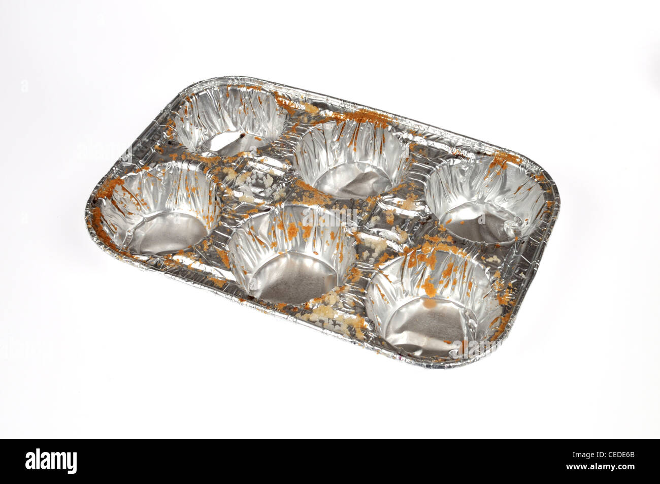Muffin vide d'aluminium 6 Pack tin sur fond blanc dentelle Banque D'Images