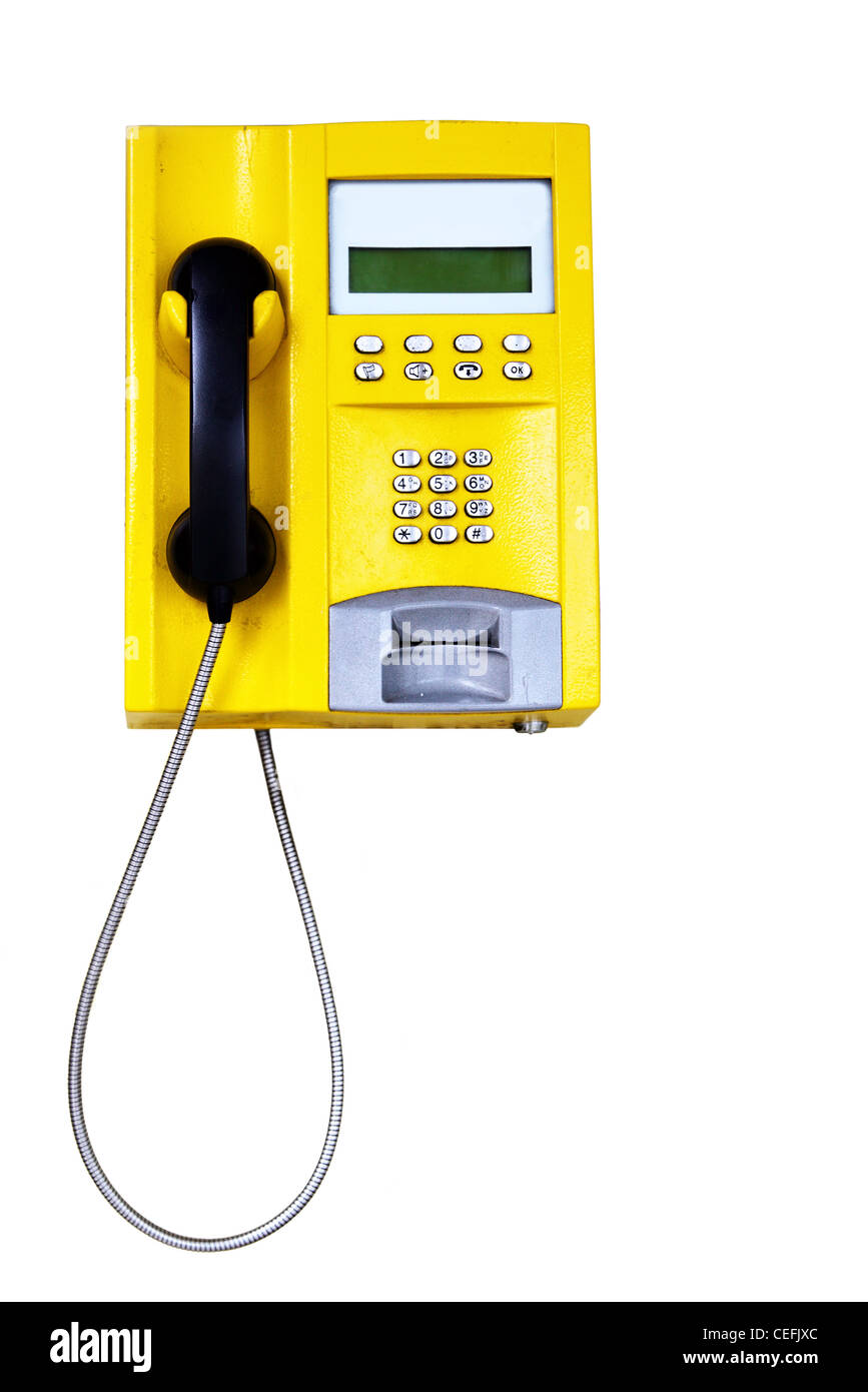 Téléphone public jaune isolé sur fond blanc Banque D'Images