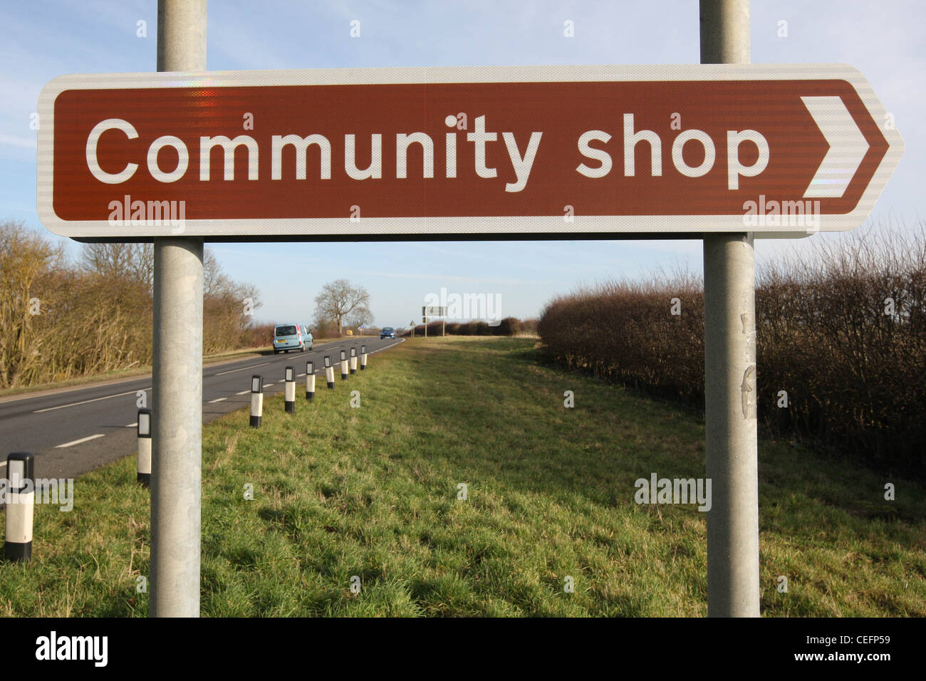 Communauté Shop Sign Banque D'Images