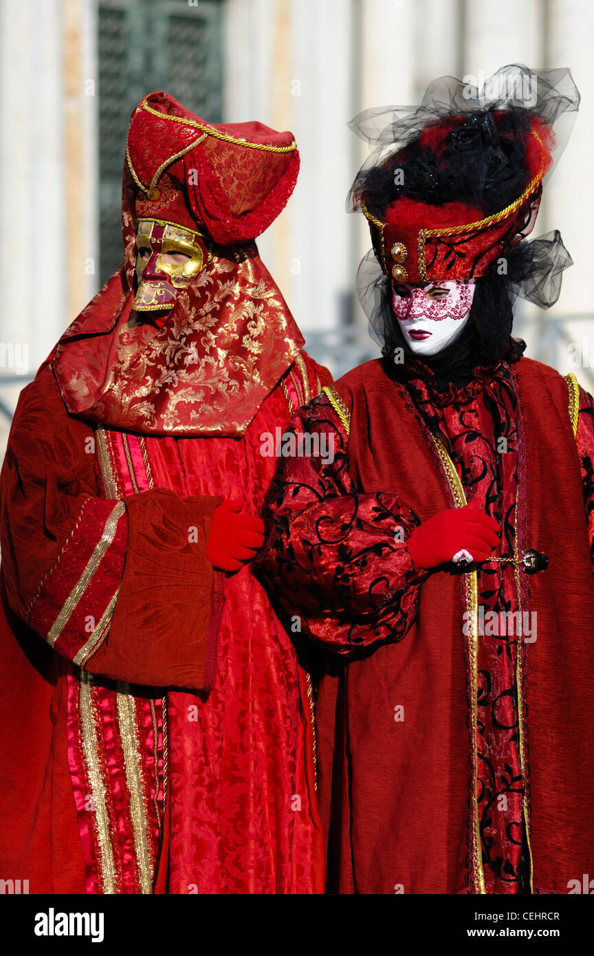 Carnaval vénitien de costumes à la place San Marco Banque D'Images