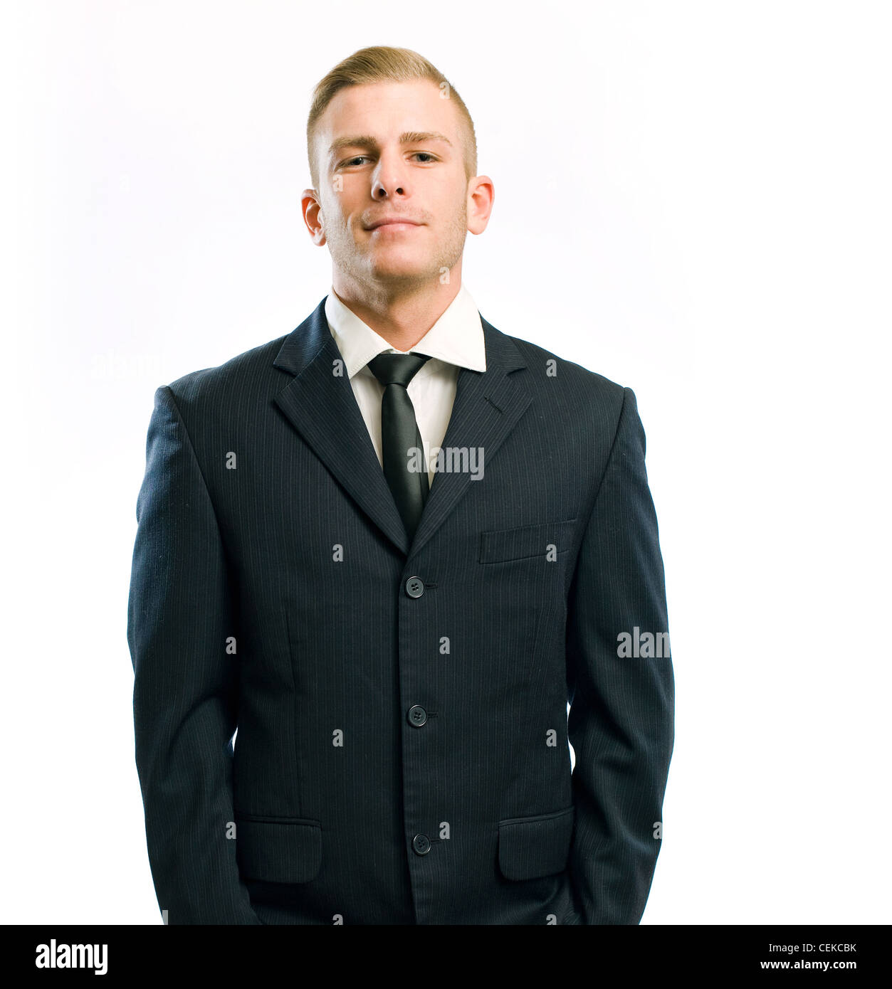 Portrait d'un fier jeune homme isolé sur blanc. Banque D'Images