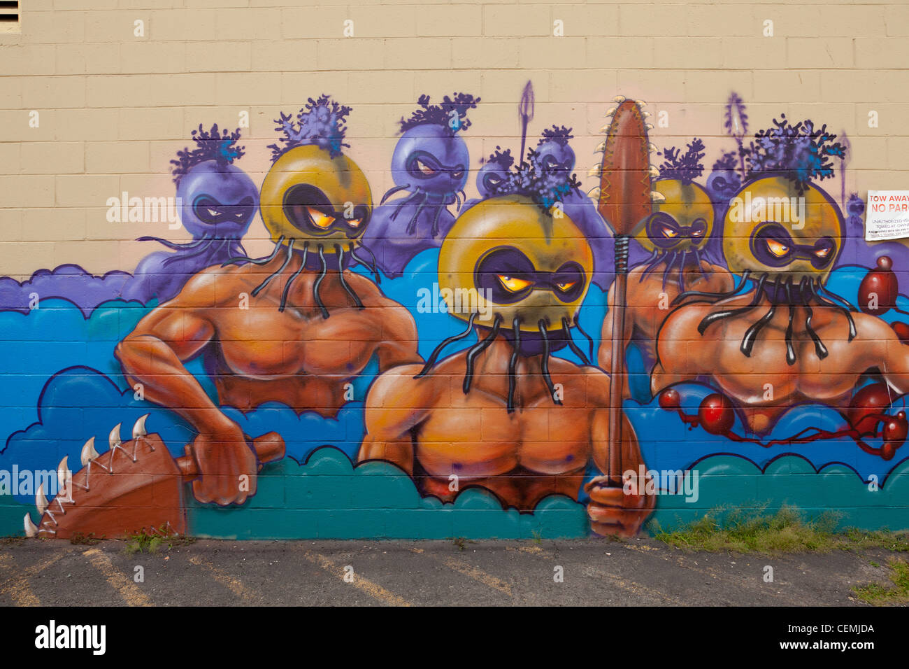 Street art contemporain, Hawaiian warriors avec masque et d'armes anciennes Banque D'Images