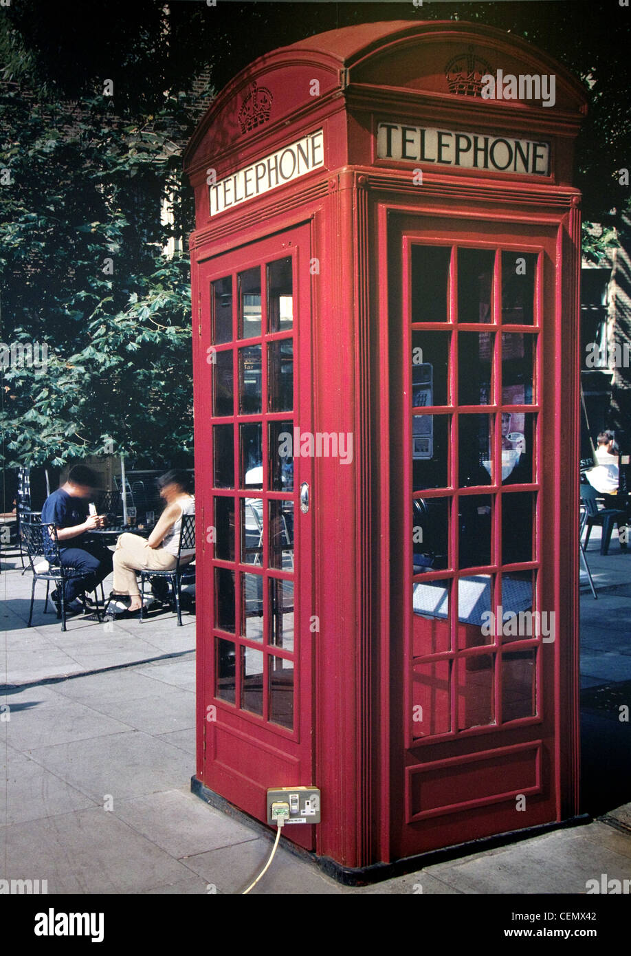 L'aéroport de Glasgow Phone box plug Poster Téléphone rouge en Écosse, Angleterre, RU 13a formation de bouchon en bas à gauche Banque D'Images