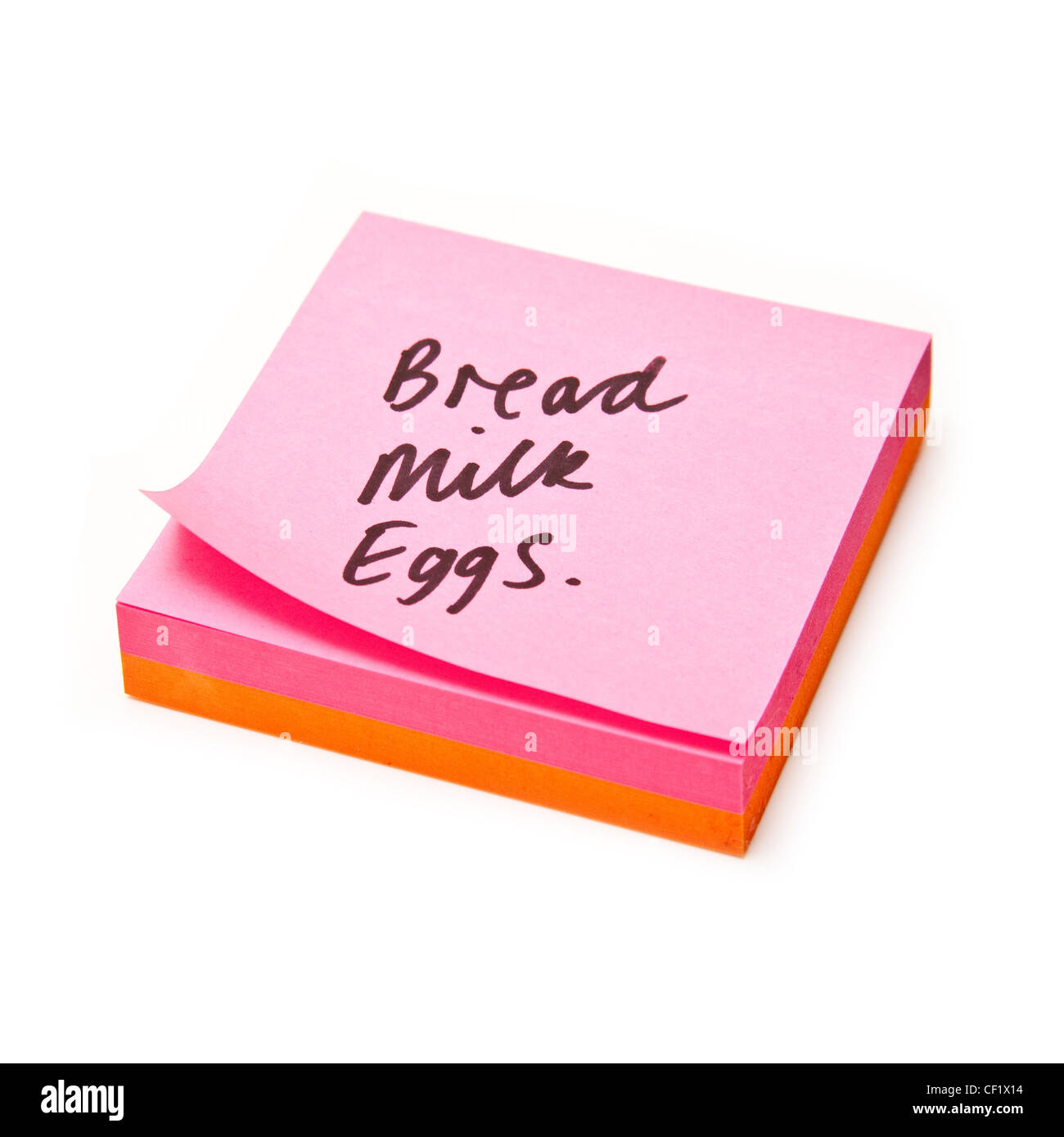 Liste de magasinage écrit sur un post-it-notes. Banque D'Images