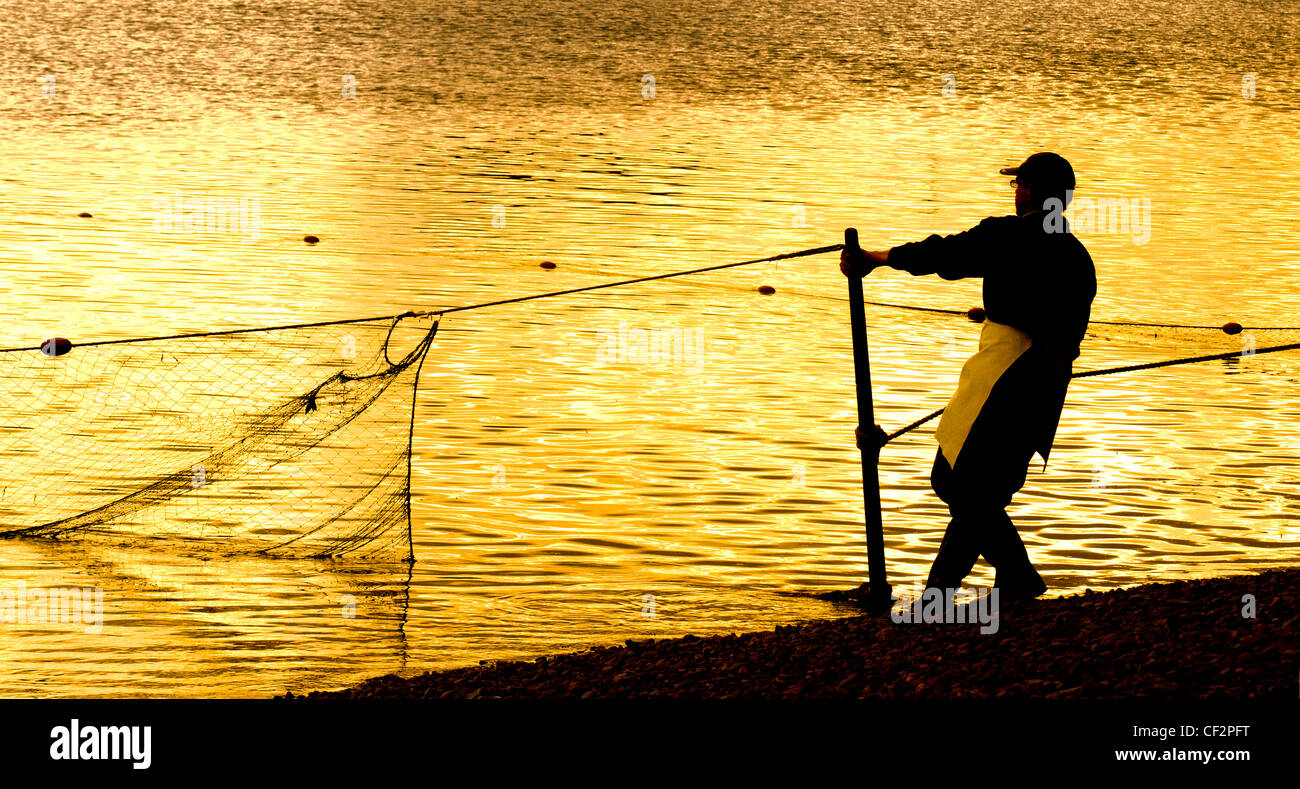 La pêche au saumon sur la rivière Tweed. Banque D'Images