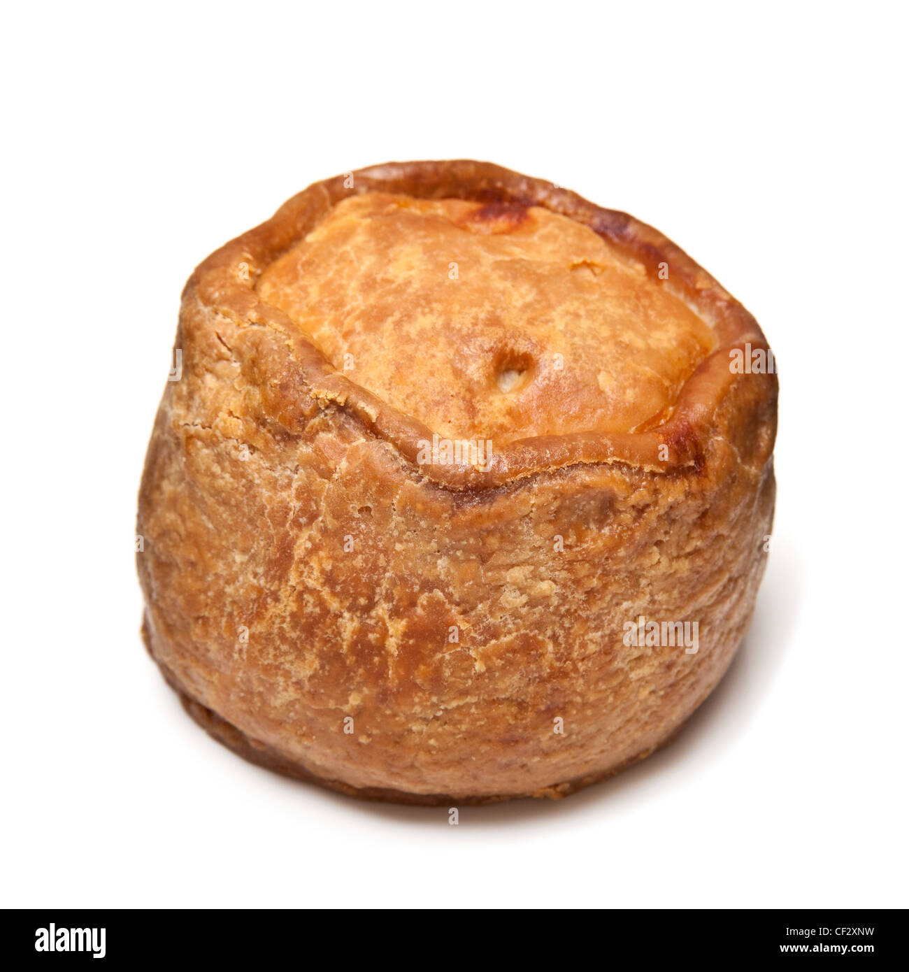 Melton Mowbray pork pie isolated on a white background studio. Banque D'Images